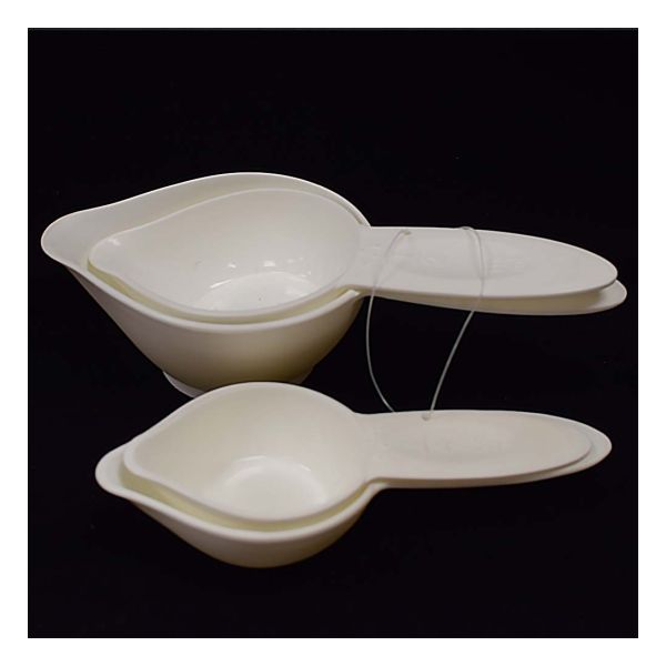 white plastic measuring cups 1/4, 1/3, 1/2, and 1 cup.